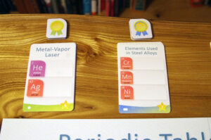 Newspaper: a card game of the elements